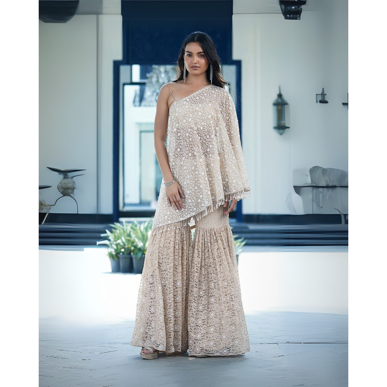 Beige Off Shoulder Sharara with Heavy Sequin work.