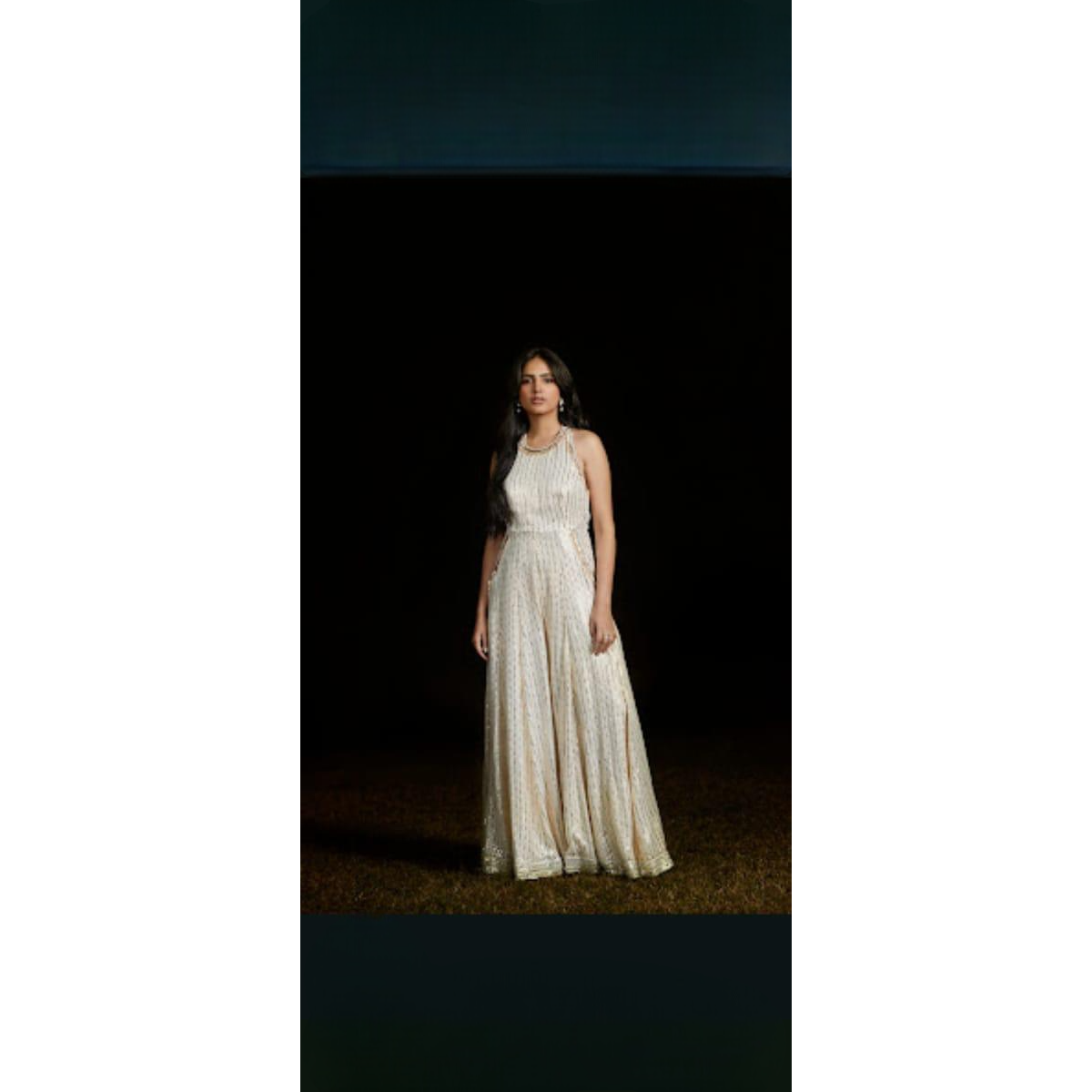 Ivory Georgette Embroidered Sequins Halter Neck Flared Jumpsuit